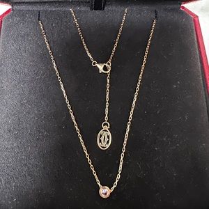 Cartier necklace, used like new. Light purple saphire